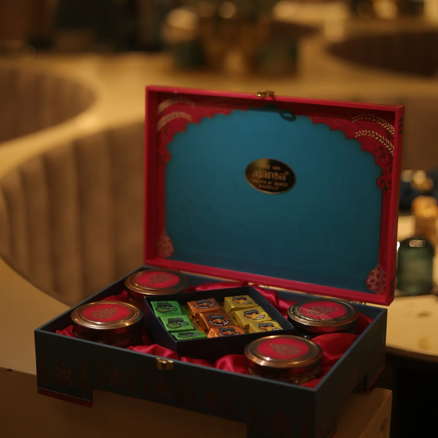 Ajanta premium gift box open with sweets, chocolates and branded tins