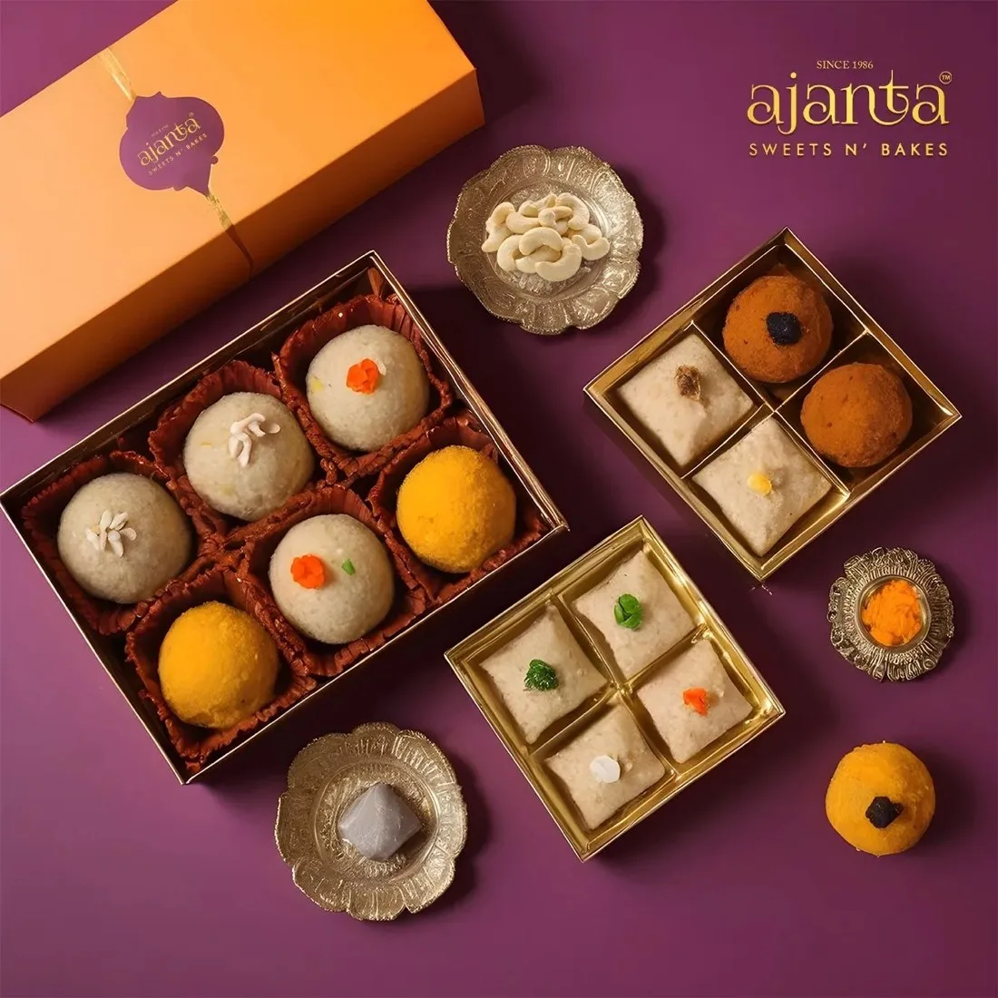 Ajanta premium laddoo and barfi gift box on purple background