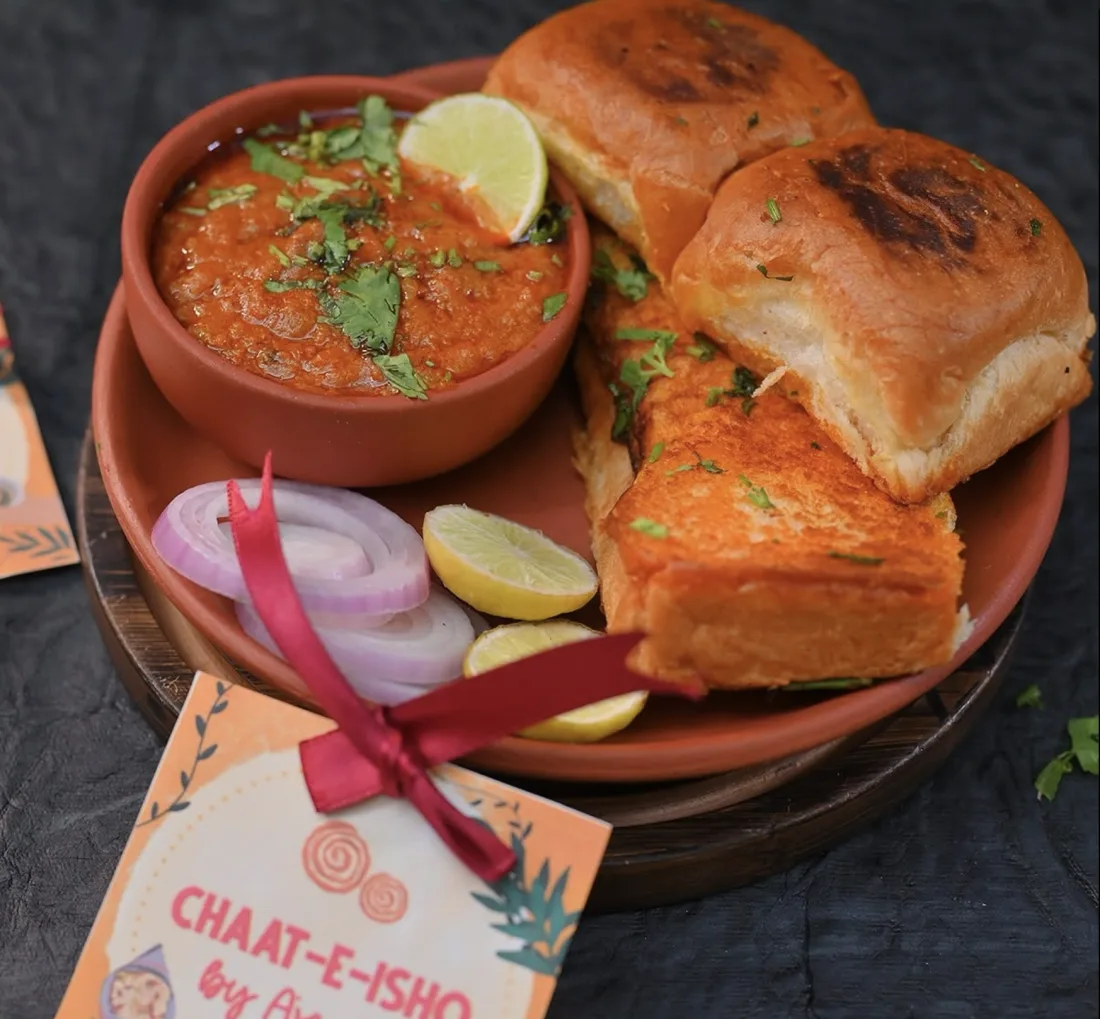 Ajanta pav bhaji served with buttered pav, onion and lemon